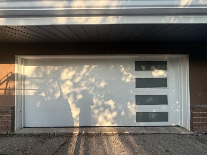 White flush garage door with frosted side windows