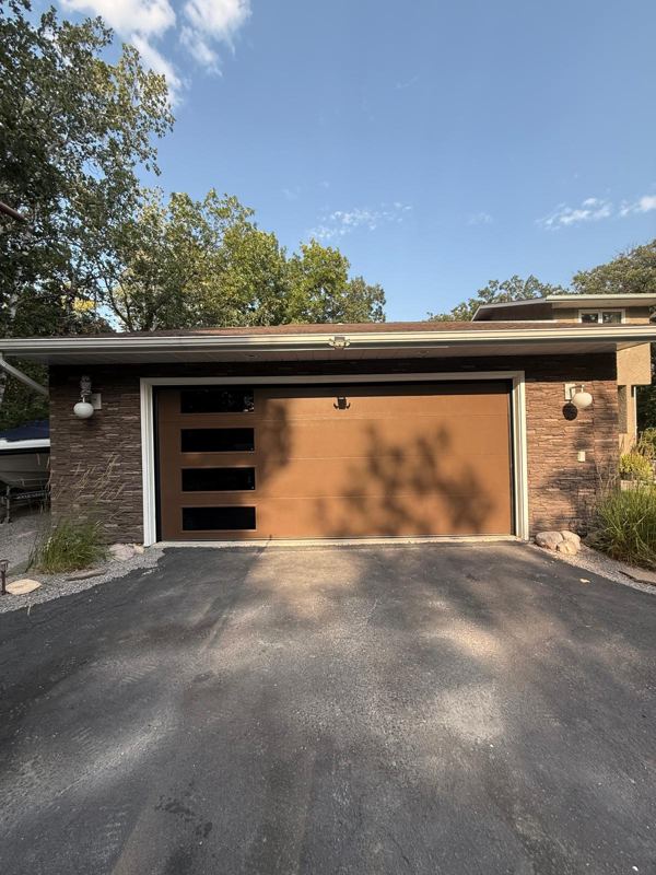 Wood-grain garage door with black side windows